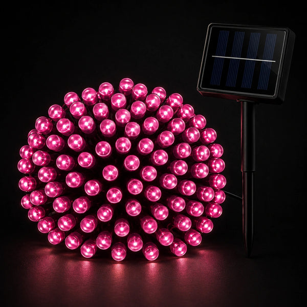 Pink string lights with a solar panel on a black background