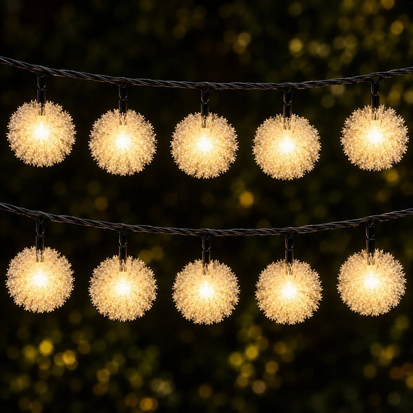 String of decorative lights with a blurred green background